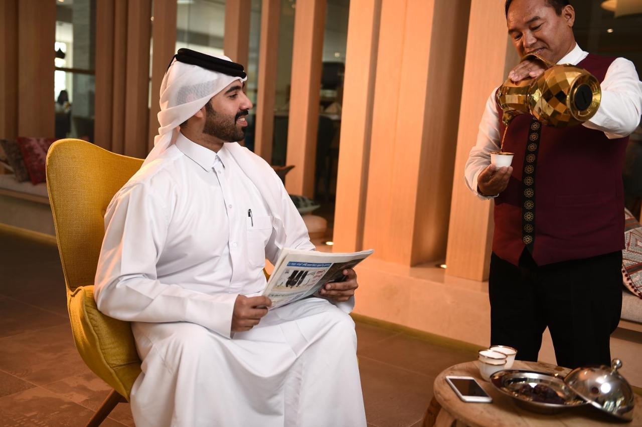 Sealine Beach, A Murwab Resort Mesaieed Exteriér fotografie A Qatari man wearing the dishda'a